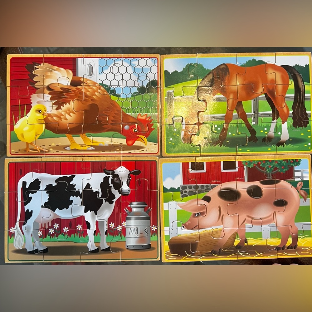 Melissa and Doug Farm 4-in-1 wooden jigsaw puzzles in a wooden storage box